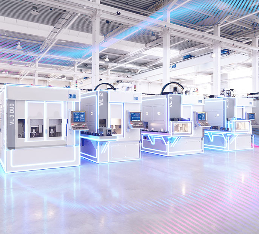 Networked EMAG machines in a production hall with visualized data connections, symbolizing segmented networks and secure remote access.