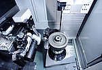 Work area of the G 400 generating and profile grinding machine for precision machining of gear parts 