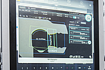 Monitor showing the recording of a light band micrometer