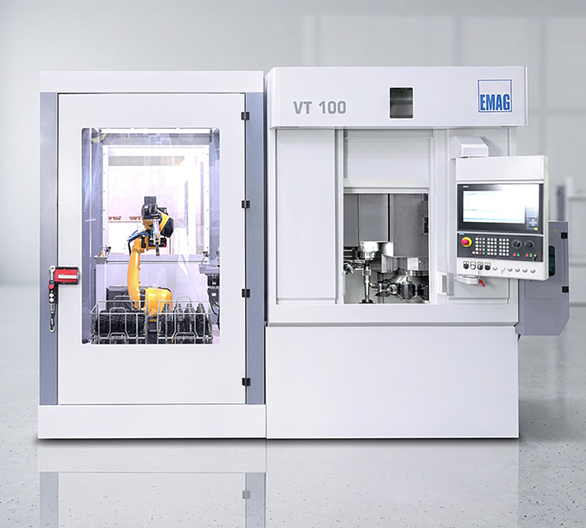 EMAG VT 100 vertical turning machine with integrated CRC robotic automation cell for shaft production