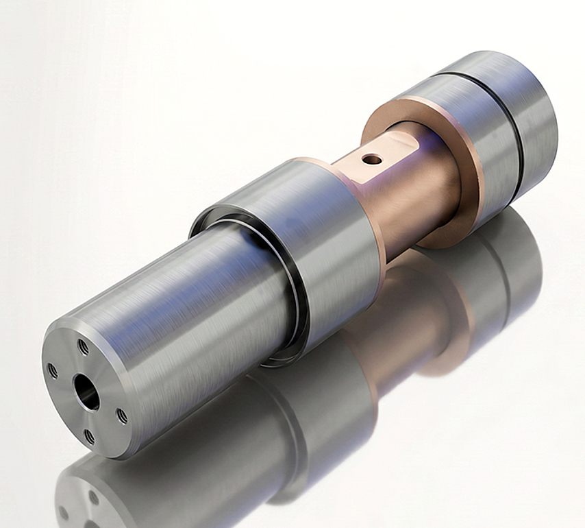 Laser-coated planetary pin for a wind turbine gearbox. The coated bearing surface is visible.