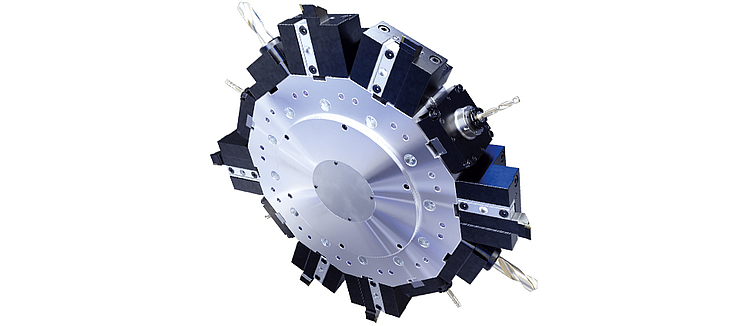 Torreta de herramientas del torno universal USC 850 con 12 posiciones para herramientas de torneado, herramientas motorizadas con suministro de refrigerante integrado para un mecanizado versátil. 