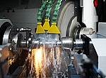 Grinding of a passenger car output shaft using a production CNC cylindrical grinder