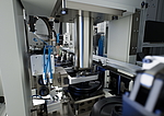 Interior view of the ELC 6i Interior view of the ELC 6i with integrated process stations: Pressing, laser cleaning, laser welding and laser marking. The compact overall housing ensures laser safety for all processes.