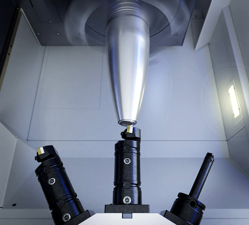 120 mm shell being machined on the EMAG VL 8: Pick-up turning machine for precise, automated finishing in the second clamping.
