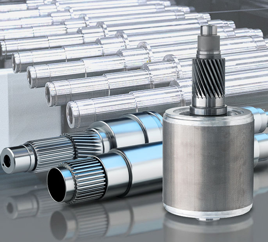 Several rotor shafts with spline and running gear teeth, as well as a mounted rotor assembly.